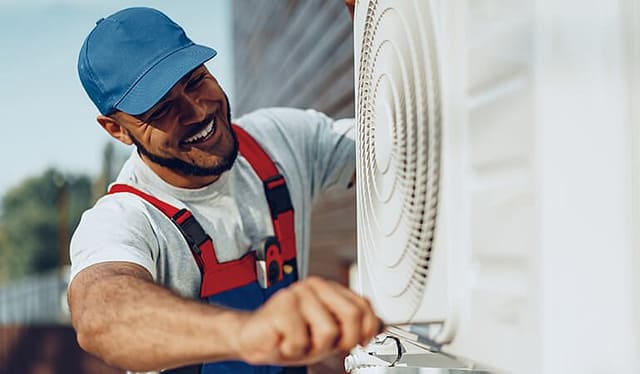 Trane certified technician performing air conditioning repair in Missouri City, TX near the Sienna community.