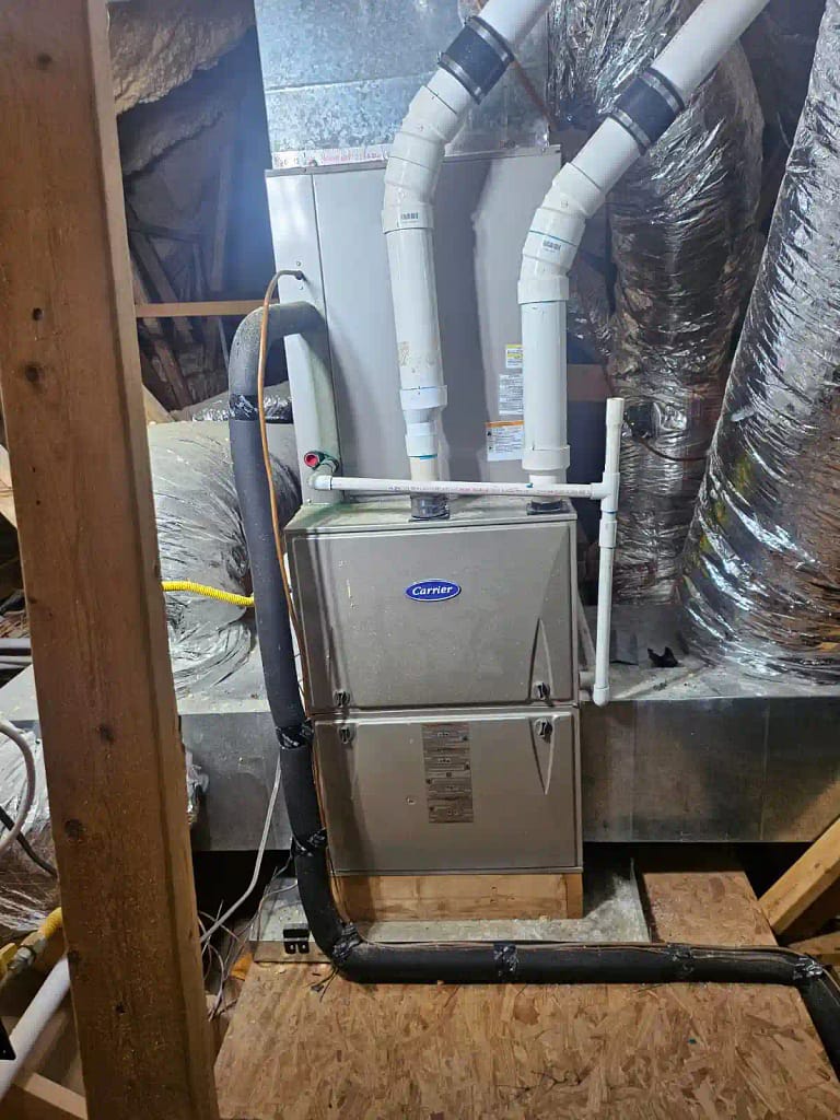 A licensed 24SevenAC technician finishing a successful furnace repair in Katy, Texas, ensuring the home is warm and safe after the heating system was blowing cold air.